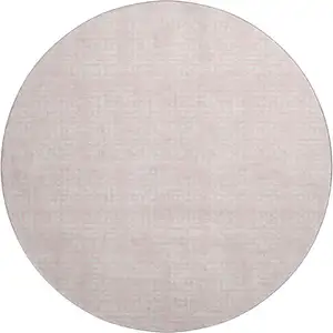 Photo of 8' Pink And Ivory Geometric Washable Round Rug With UV Protection