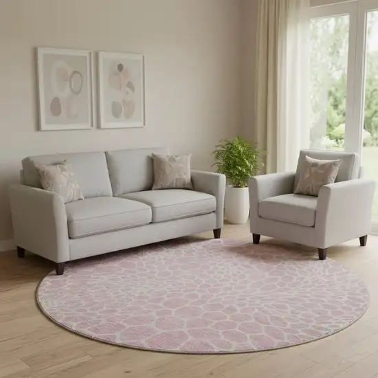 8' Pink And Ivory Geometric Washable Round Rug With UV Protection Photo 1