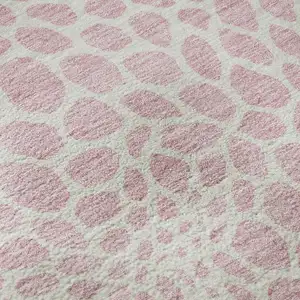 Photo of 8' Pink And Ivory Geometric Washable Round Rug With UV Protection