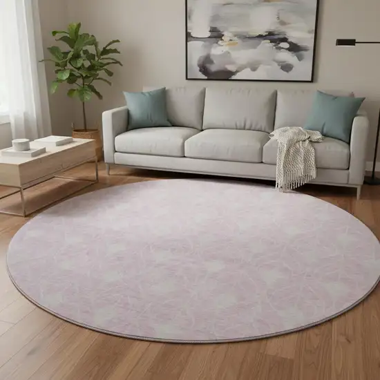 8' Pink And Ivory Geometric Washable Round Rug With UV Protection Photo 2