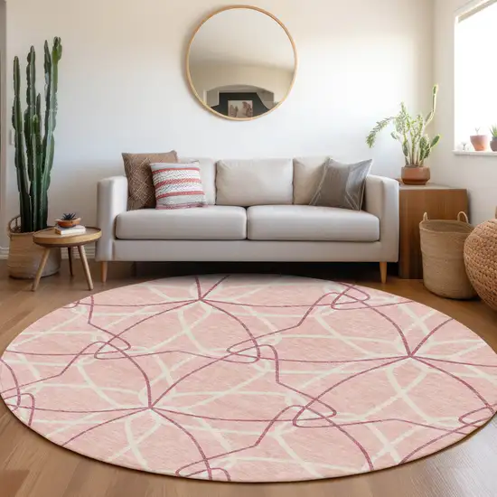 8' Pink And Ivory Geometric Washable Round Rug With UV Protection Photo 4