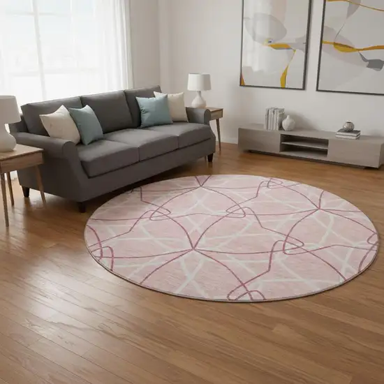 8' Pink And Ivory Geometric Washable Round Rug With UV Protection Photo 2