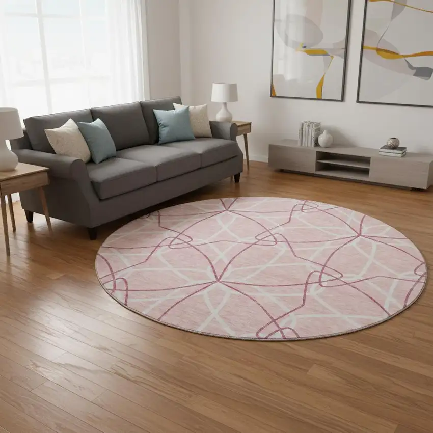 8' Pink And Ivory Geometric Washable Round Rug With UV Protection Photo 2