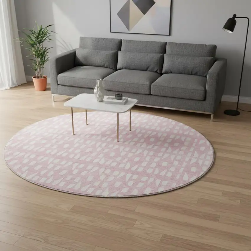 8' Pink And Ivory Geometric Washable Round Rug With UV Protection Photo 2