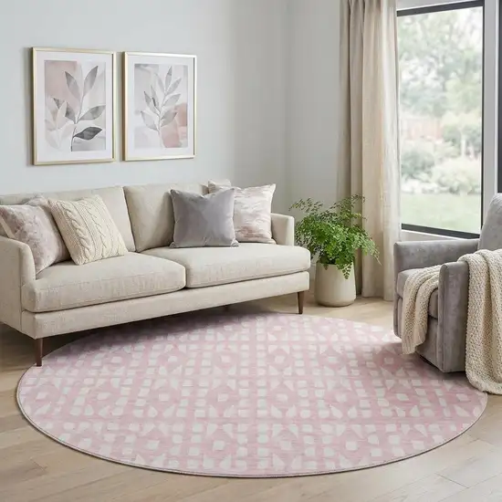 8' Pink And Ivory Geometric Washable Round Rug With UV Protection Photo 1