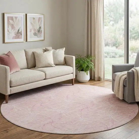 8' Pink And Ivory Geometric Washable Round Rug With UV Protection Photo 1