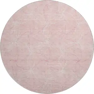 Photo of 8' Pink And Ivory Geometric Washable Round Rug With UV Protection