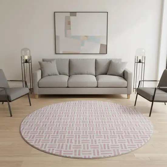 8' Pink And Ivory Geometric Washable Round Rug With UV Protection Photo 2