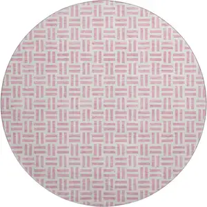 Photo of 8' Pink And Ivory Geometric Washable Round Rug With UV Protection