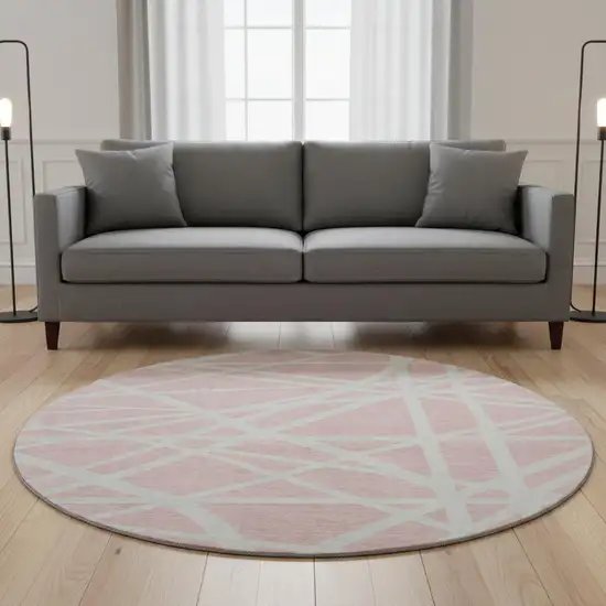 8' Pink And Ivory Geometric Washable Round Rug With UV Protection Photo 2