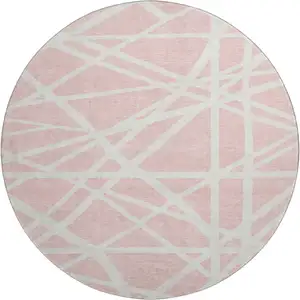 Photo of 8' Pink And Ivory Geometric Washable Round Rug With UV Protection