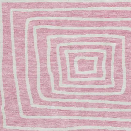 8' Pink And Ivory Geometric Washable Round Rug With UV Protection Photo 2