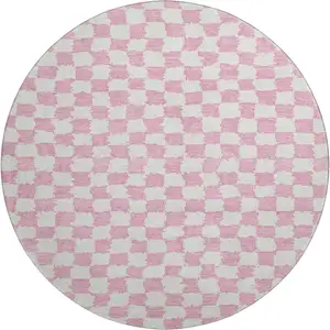 Photo of 8' Pink And Ivory Geometric Washable Round Rug With UV Protection