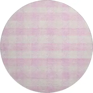 Photo of 8' Pink And Ivory Plaid Washable Round Rug With UV Protection