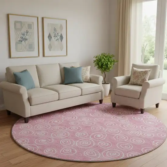 8' Pink And Ivory Polka Dot Washable Round Rug With UV Protection Photo 1