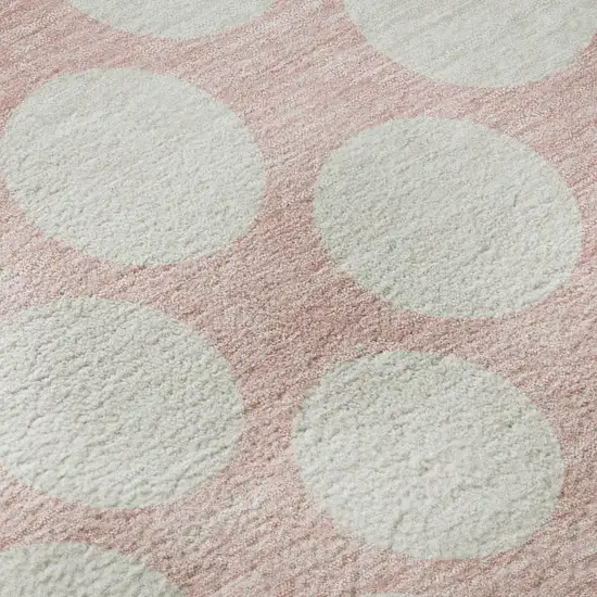 8' Pink And Ivory Polka Dot Washable Round Rug With UV Protection Photo 9