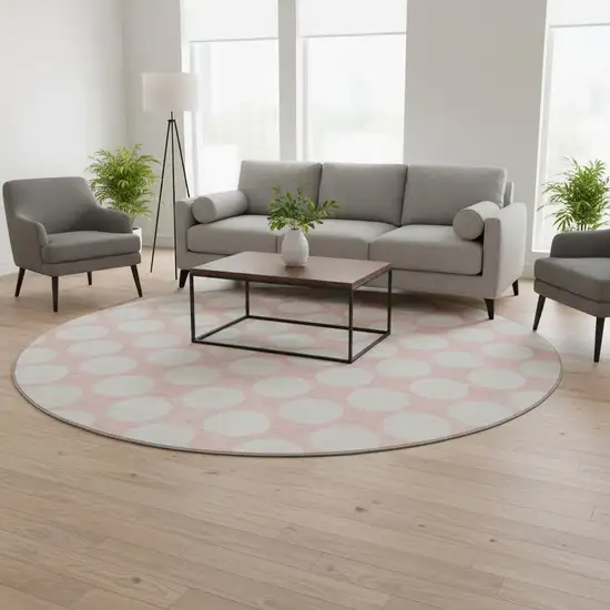 8' Pink And Ivory Polka Dot Washable Round Rug With UV Protection Photo 2