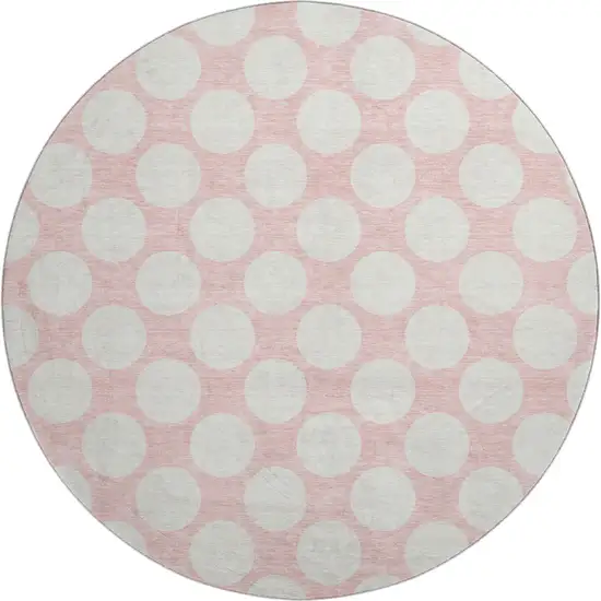 8' Pink And Ivory Polka Dot Washable Round Rug With UV Protection Photo 1