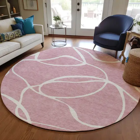 8' Pink And Ivory Round Abstract Washable Indoor Outdoor Area Rug Photo 8