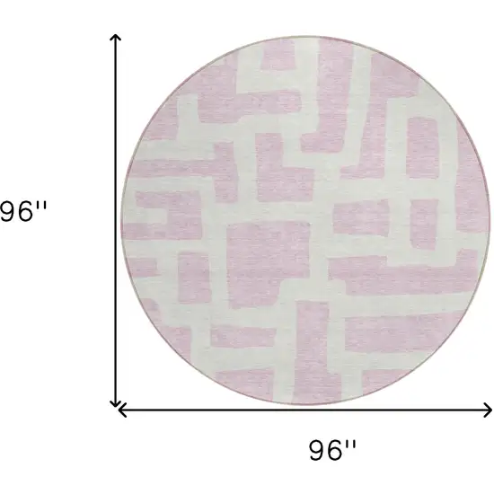 8' Pink And Ivory Round Abstract Washable Indoor Outdoor Area Rug Photo 3