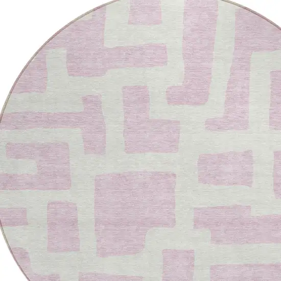 8' Pink And Ivory Round Abstract Washable Indoor Outdoor Area Rug Photo 4