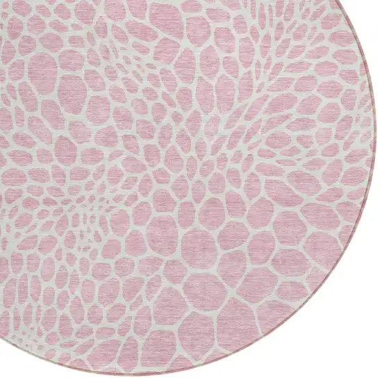 8' Pink And Ivory Round Geometric Washable Indoor Outdoor Area Rug Photo 5