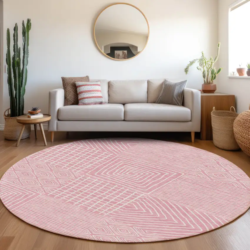 8' Pink And Ivory Round Geometric Washable Indoor Outdoor Area Rug Photo 9