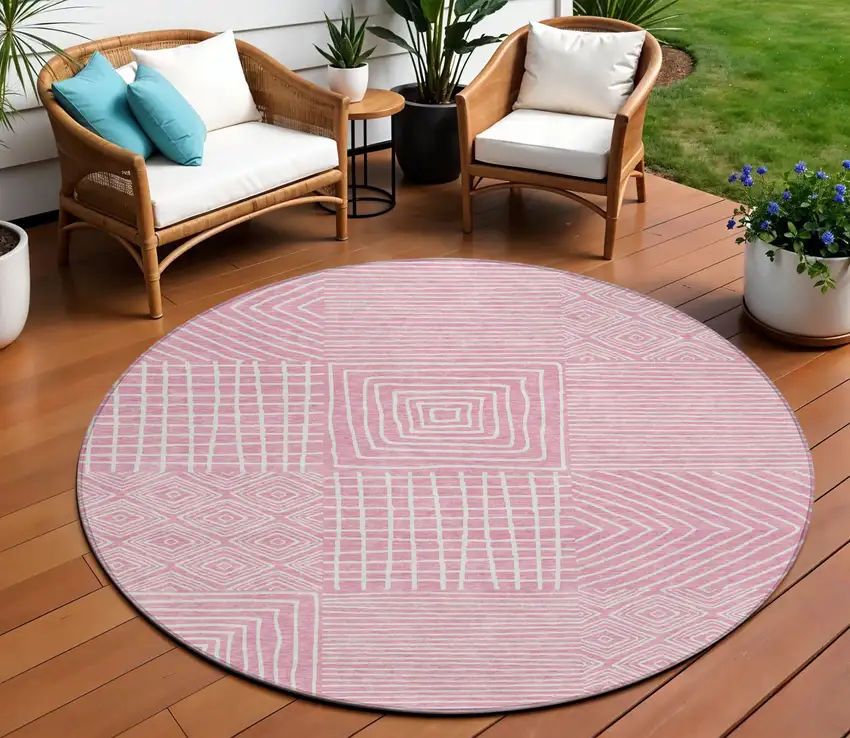 8' Pink And Ivory Round Geometric Washable Indoor Outdoor Area Rug Photo 1