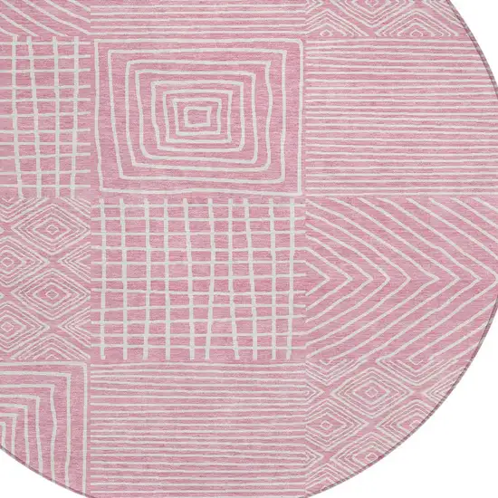 8' Pink And Ivory Round Geometric Washable Indoor Outdoor Area Rug Photo 6