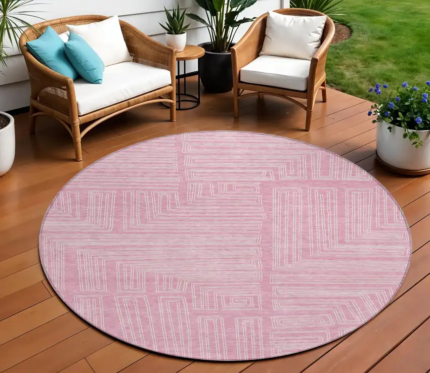 8' Pink And Ivory Round Geometric Washable Indoor Outdoor Area Rug Photo 1