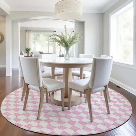 8' Pink And Ivory Round Geometric Washable Indoor Outdoor Area Rug Photo 6