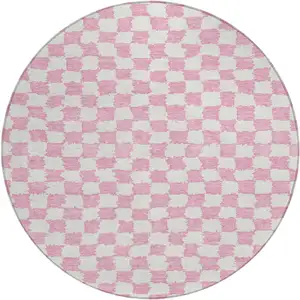 Photo of 8' Pink And Ivory Round Geometric Washable Indoor Outdoor Area Rug