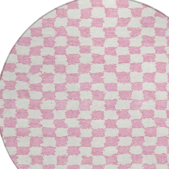8' Pink And Ivory Round Geometric Washable Indoor Outdoor Area Rug Photo 8