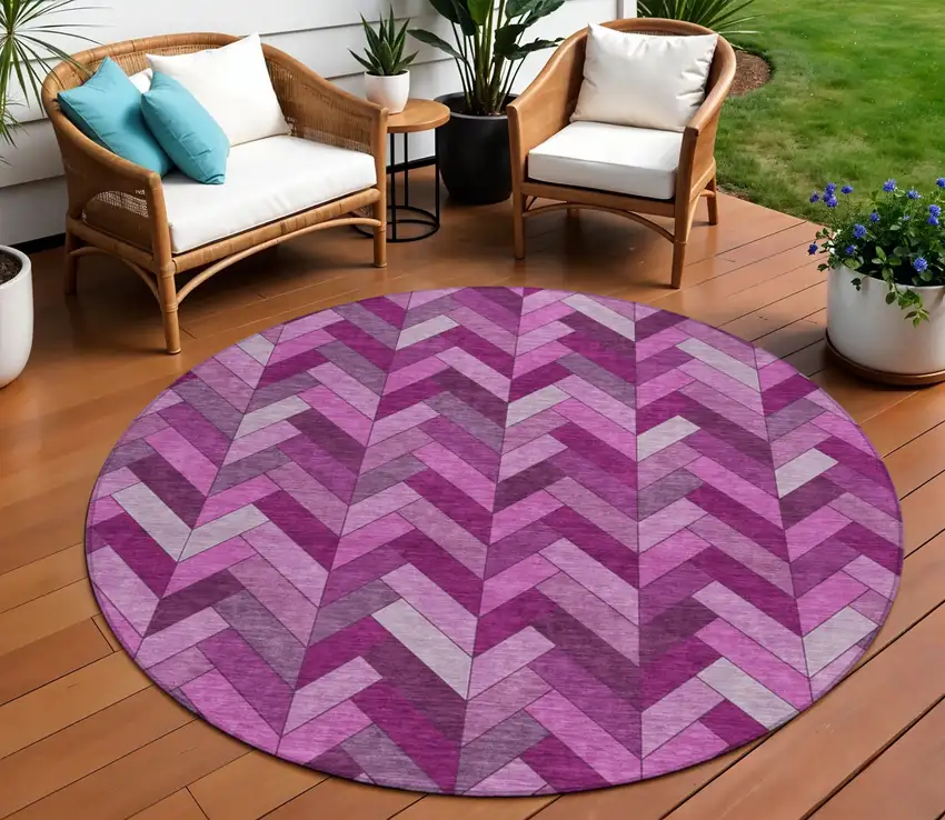 8' Pink And Ivory Round Geometric Washable Indoor Outdoor Area Rug Photo 1