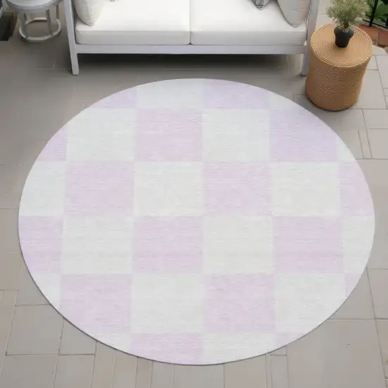 8' Pink And Ivory Round Geometric Washable Indoor Outdoor Area Rug Photo 8