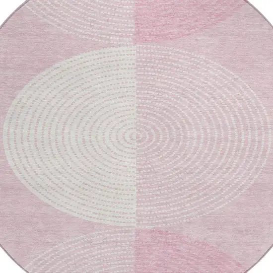 8' Pink And Ivory Round Geometric Washable Indoor Outdoor Area Rug Photo 7