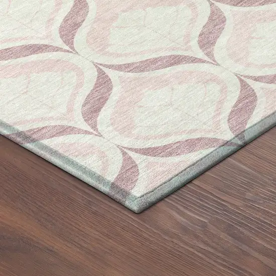 8' Pink And Ivory Round Geometric Washable Indoor Outdoor Area Rug Photo 8