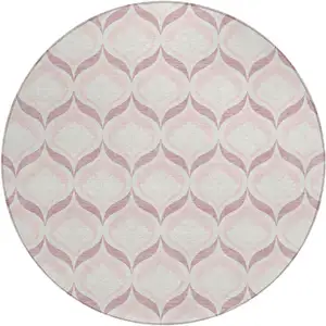 Photo of 8' Pink And Ivory Round Geometric Washable Indoor Outdoor Area Rug