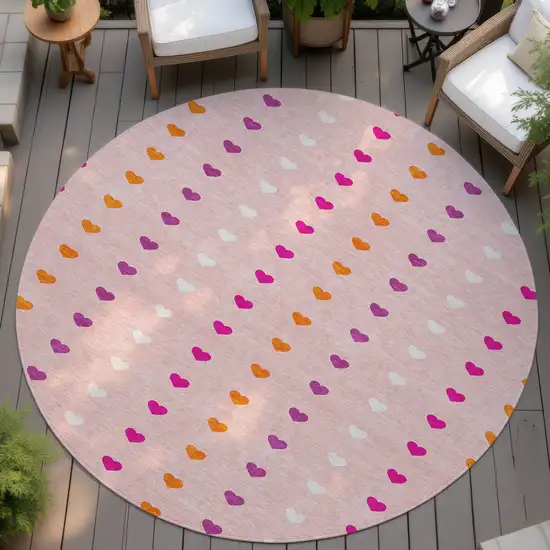 8' Pink And Ivory Round Geometric Washable Indoor Outdoor Area Rug Photo 4
