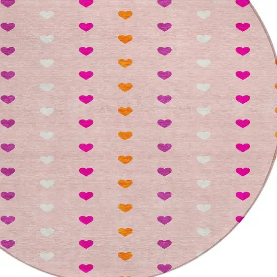 8' Pink And Ivory Round Geometric Washable Indoor Outdoor Area Rug Photo 2