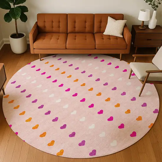 8' Pink And Ivory Round Geometric Washable Indoor Outdoor Area Rug Photo 5