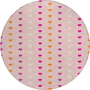 Photo of 8' Pink And Ivory Round Geometric Washable Indoor Outdoor Area Rug