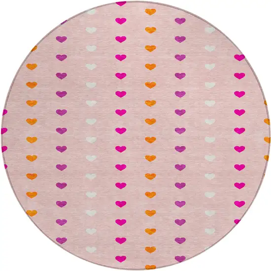 8' Pink And Ivory Round Geometric Washable Indoor Outdoor Area Rug Photo 1