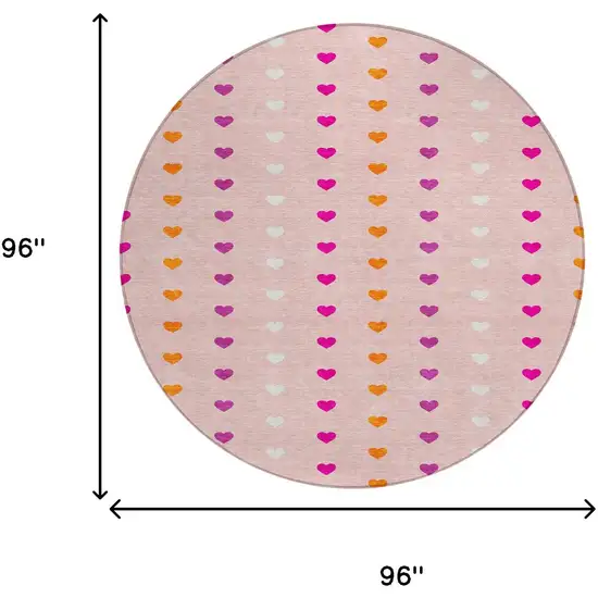 8' Pink And Ivory Round Geometric Washable Indoor Outdoor Area Rug Photo 8