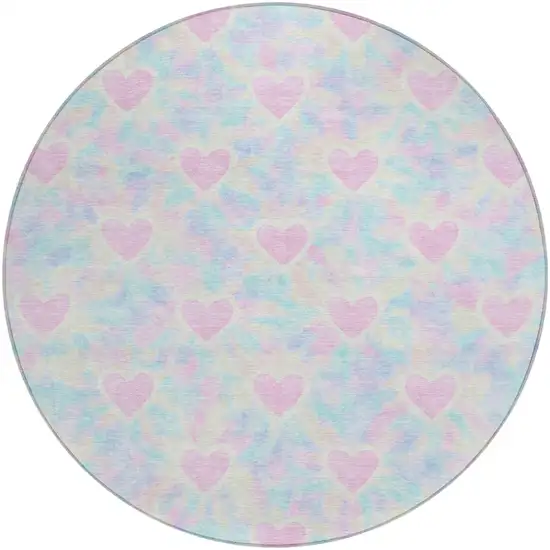 8' Pink And Ivory Round Geometric Washable Indoor Outdoor Area Rug Photo 1