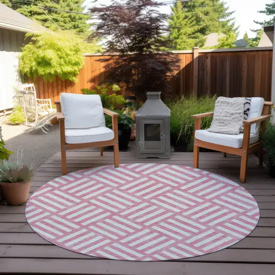 8' Pink And Ivory Round Geometric Washable Indoor Outdoor Area Rug Photo 6