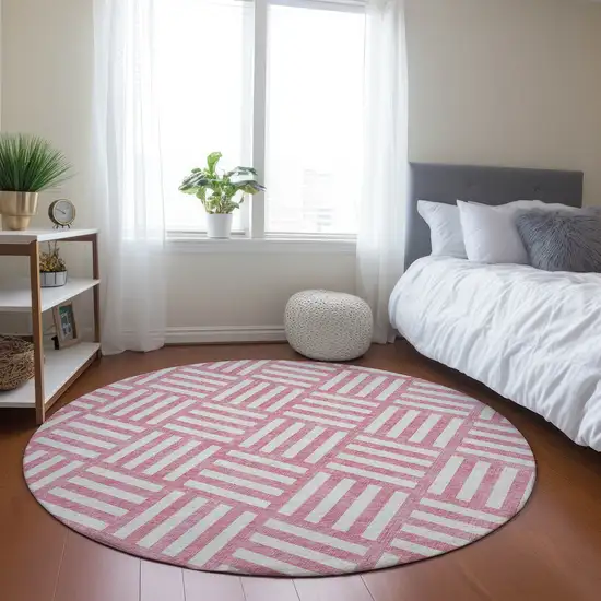 8' Pink And Ivory Round Geometric Washable Indoor Outdoor Area Rug Photo 7
