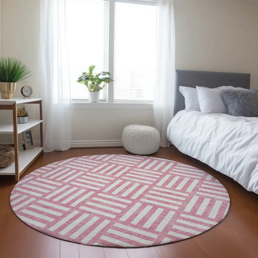 8' Pink And Ivory Round Geometric Washable Indoor Outdoor Area Rug Photo 7