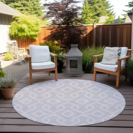 8' Pink And Ivory Round Geometric Washable Indoor Outdoor Area Rug Photo 5