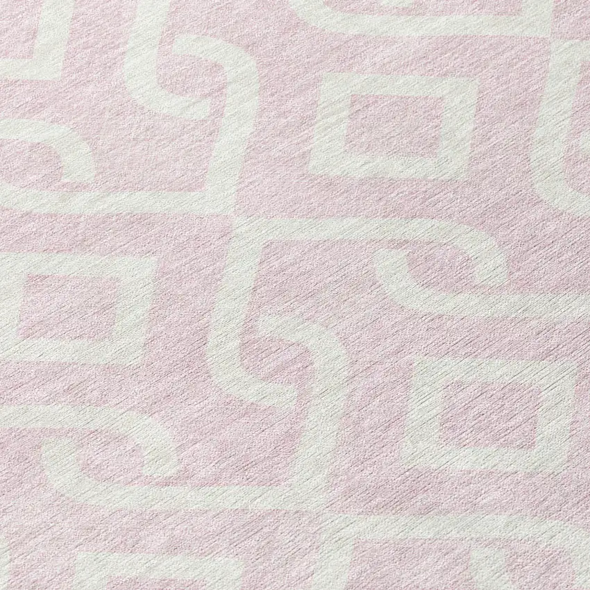 8' Pink And Ivory Round Geometric Washable Indoor Outdoor Area Rug Photo 7